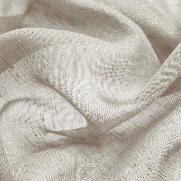 Glittering light champagne fabric with soft drapes